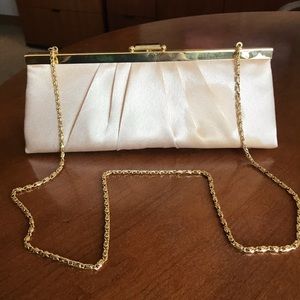 Woman’s satin Gold clutch